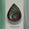 delightfully edgy sea foam green quilling paper with deep red shimmer