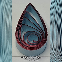 delightfully edgy baby blue quilling paper with deep red shimmer edge