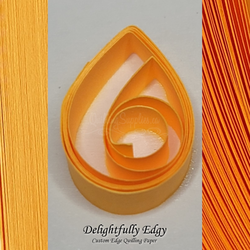 delightfully edgy bright orange quilling paper