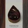 delightfully edgy brown quilling paper with deep red shimmer edge