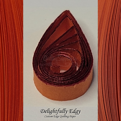 delightfully edgy orange quilling paper with deep red shimmer edge