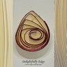 delightfully edgy cream quilling paper with deep red shimmer teardrops