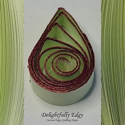 delightfully edgy tea green quilling paper with deep red shimmer